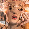 An advertising  underwater photography by the underwater photographer Silvia Boccato in her personal journey in search of flowing emotions nowadays makes her explore the field of advertising and human portrait under the water surface in a underwater studio