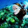 The nice and delicate face of Maya Zavrtanic, the faithful model of the underwater photographer Silvia Boccato, during the international underwater photography competitions or fotosub shooted with an innovative technique of the rotation of the itself camera. Il delicato e bel viso di Maya Zavrtanic